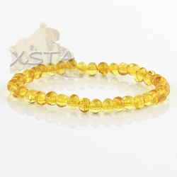 Amber bracelet dark yellow